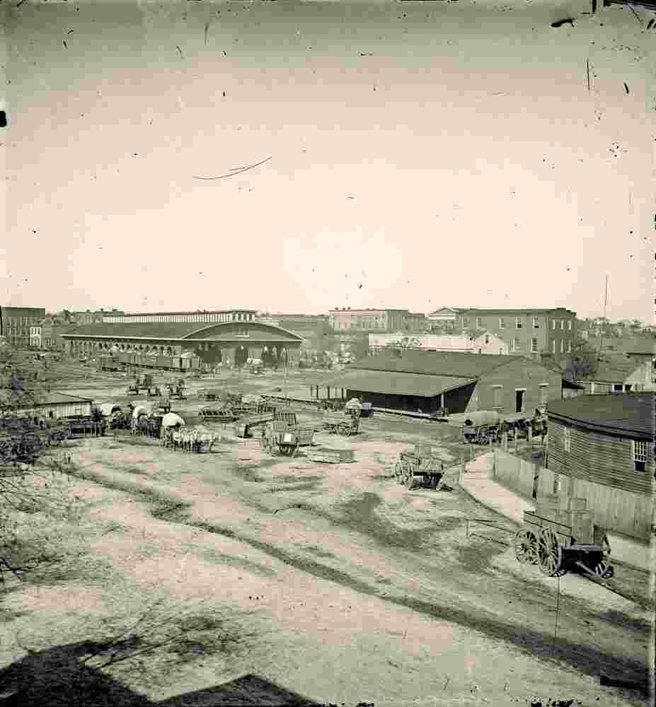Atlanta. Railroad depot and yard, Trout House and Masonic Hall in background, 1864
