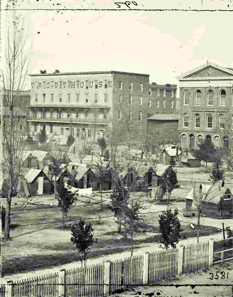 Atlanta. Trout House, Masonic Hall, and Federal encampment on Decatur Street, 1864