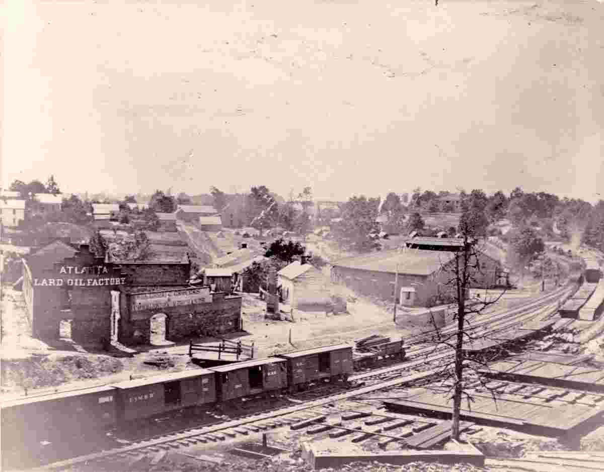 View of Atlanta, with railroad cars in left foreground, between 1860 and 1910