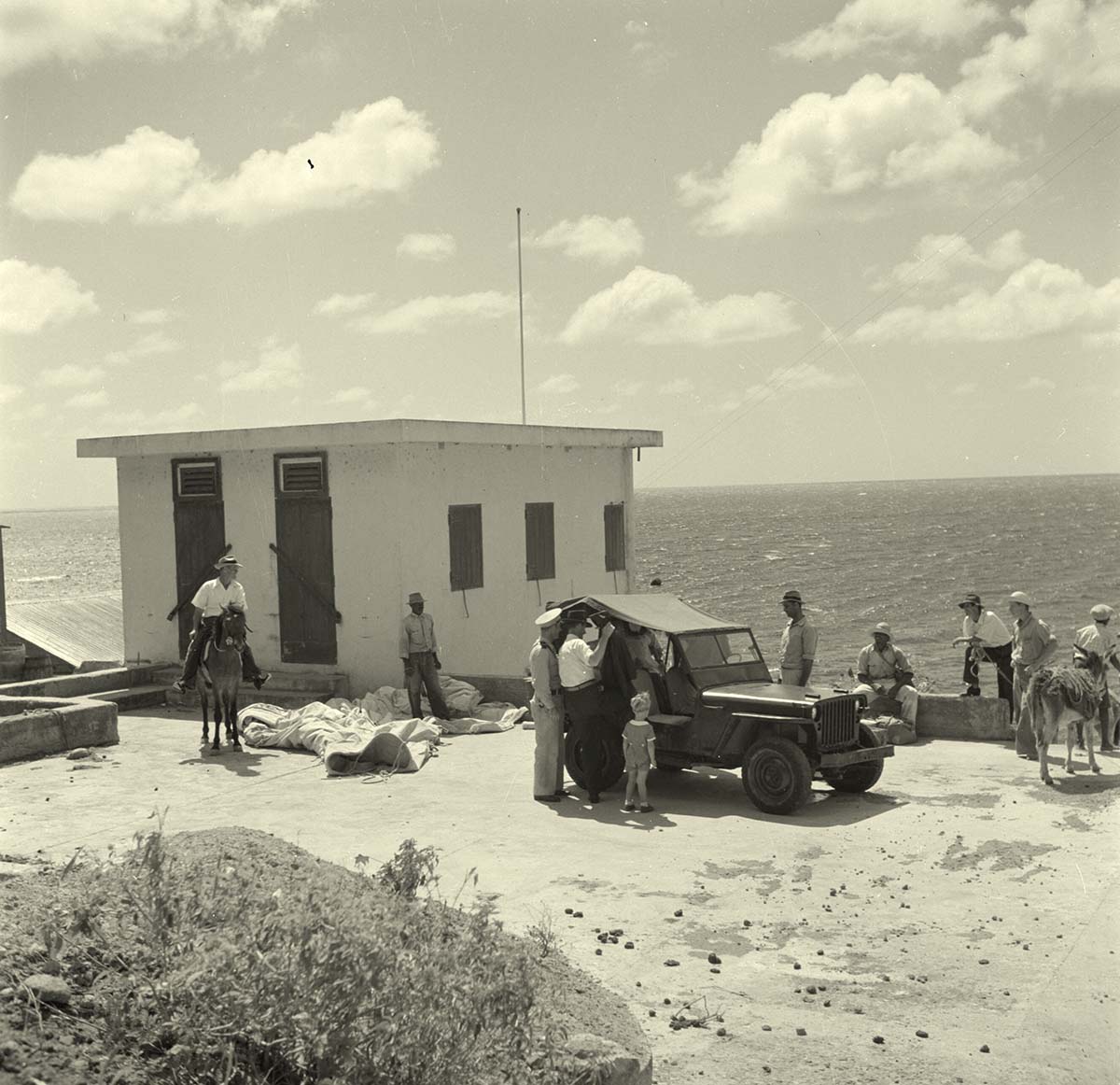 The Bottom. A jeep in Fort Bay, 1947