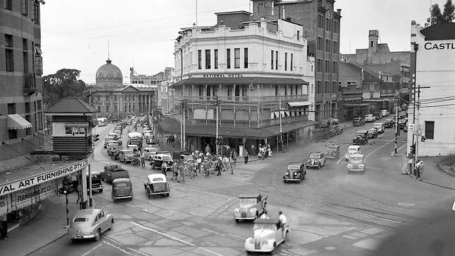 Brisbane. The National Hotel at the intersection of Queen and Adelaide streets