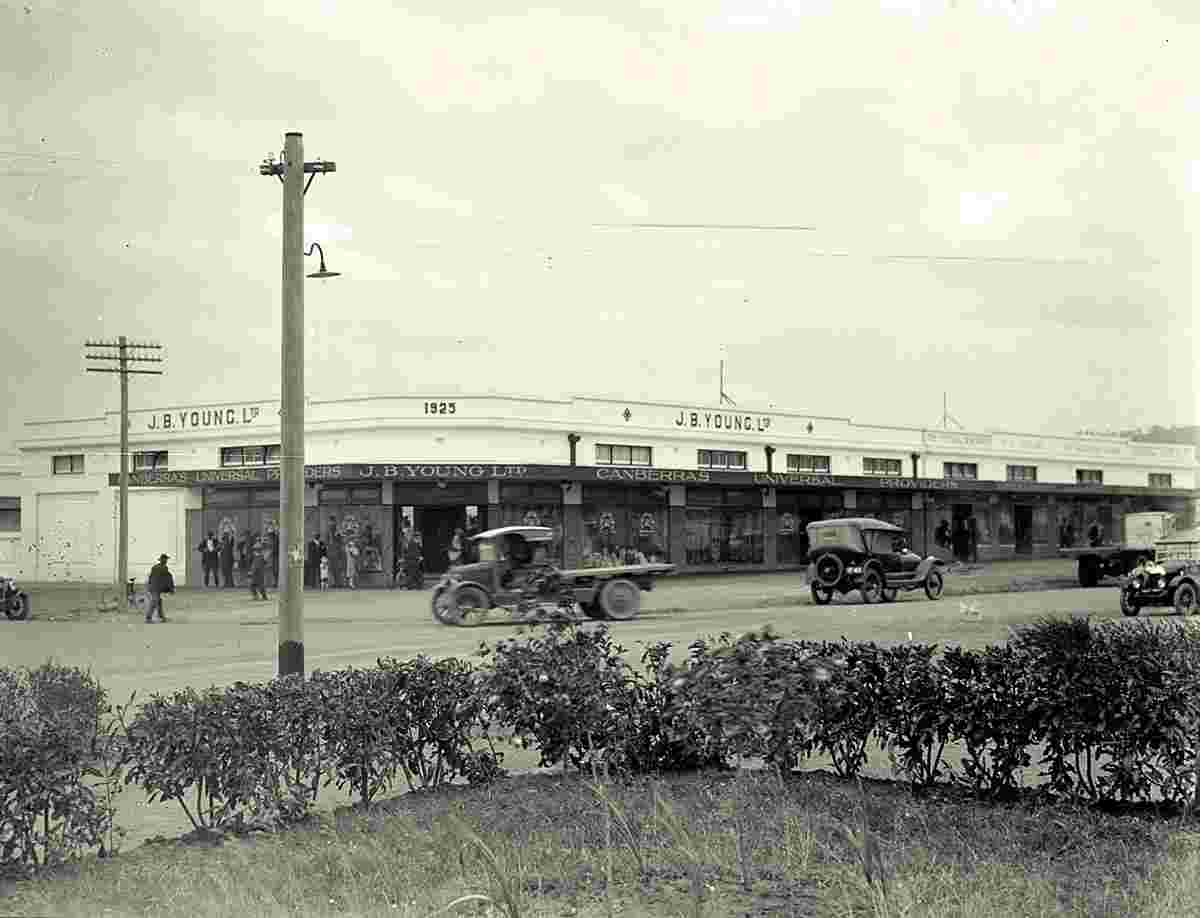 Canberra. J B Youngs store at Kingston with motor vehicles