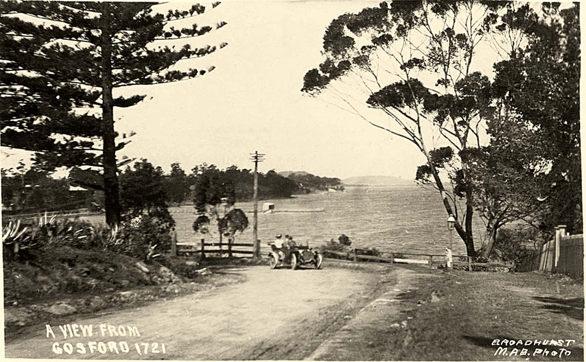 Gosford. Panorama of the road with car, between 1900 and 1927