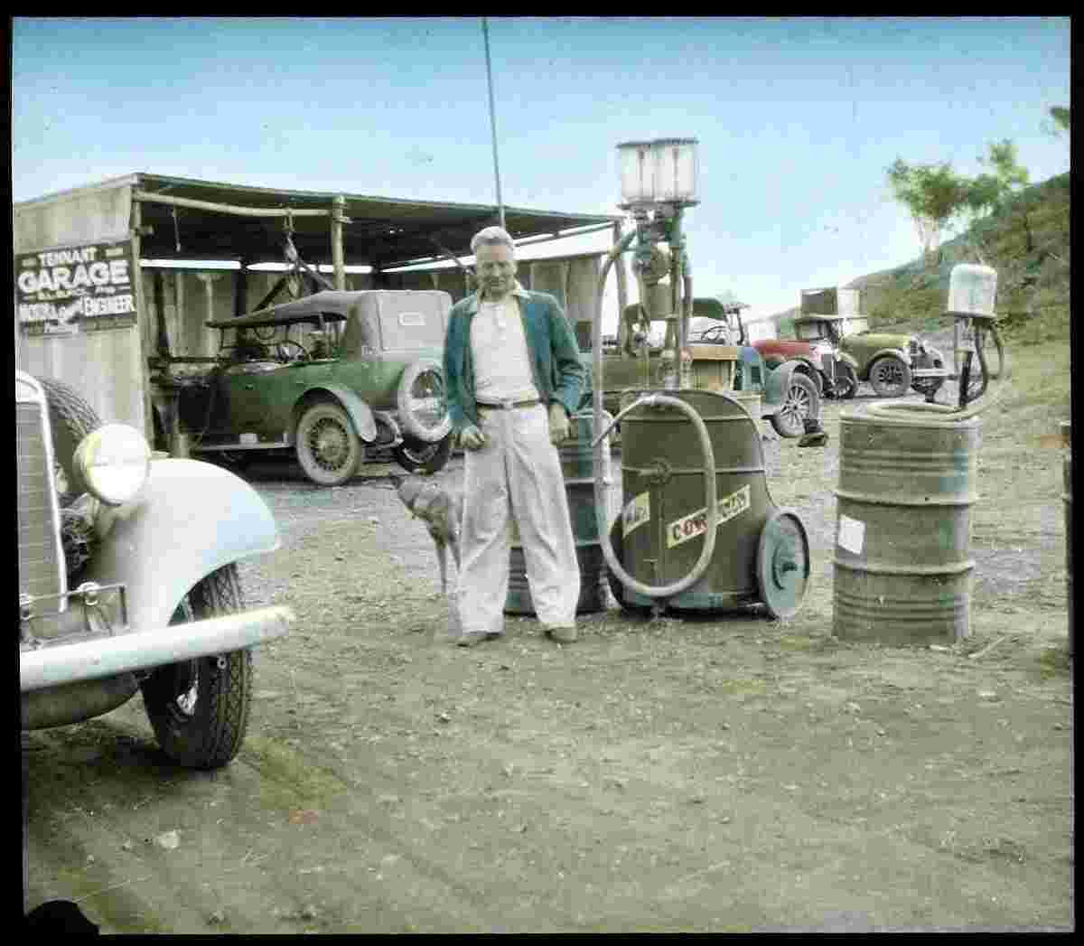 Tennant Creek. Man at Tennant garage petrol bowser, between 1912 and 1951
