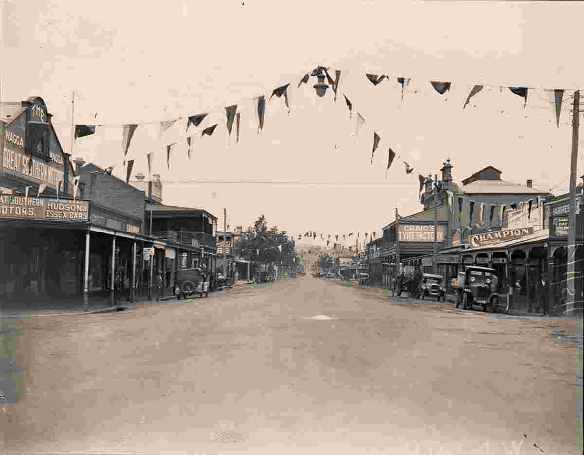 Wagga Wagga. Bunting decorating a business lined street in southern district, 1930s