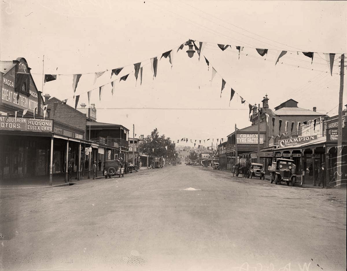 Wagga Wagga. Bunting decorating a business lined street in southern district, 1930s