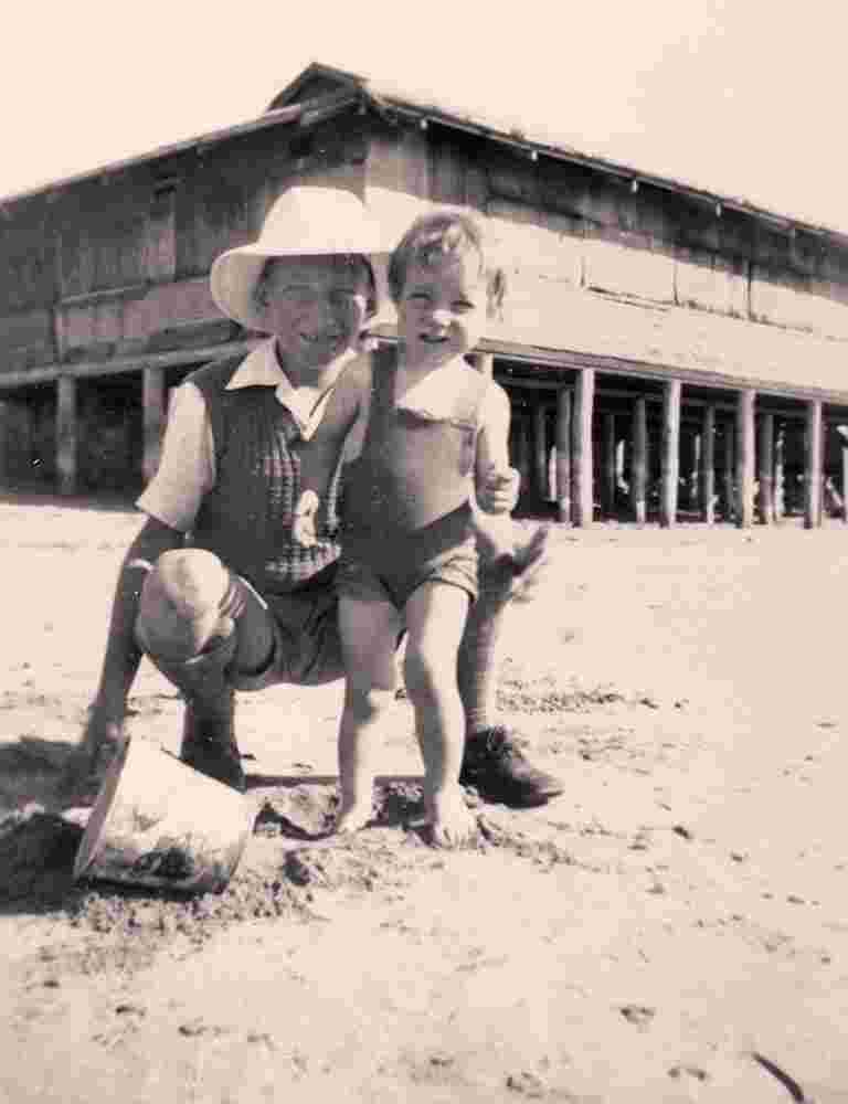 Yeppoon. Children playing on the sand, 1948