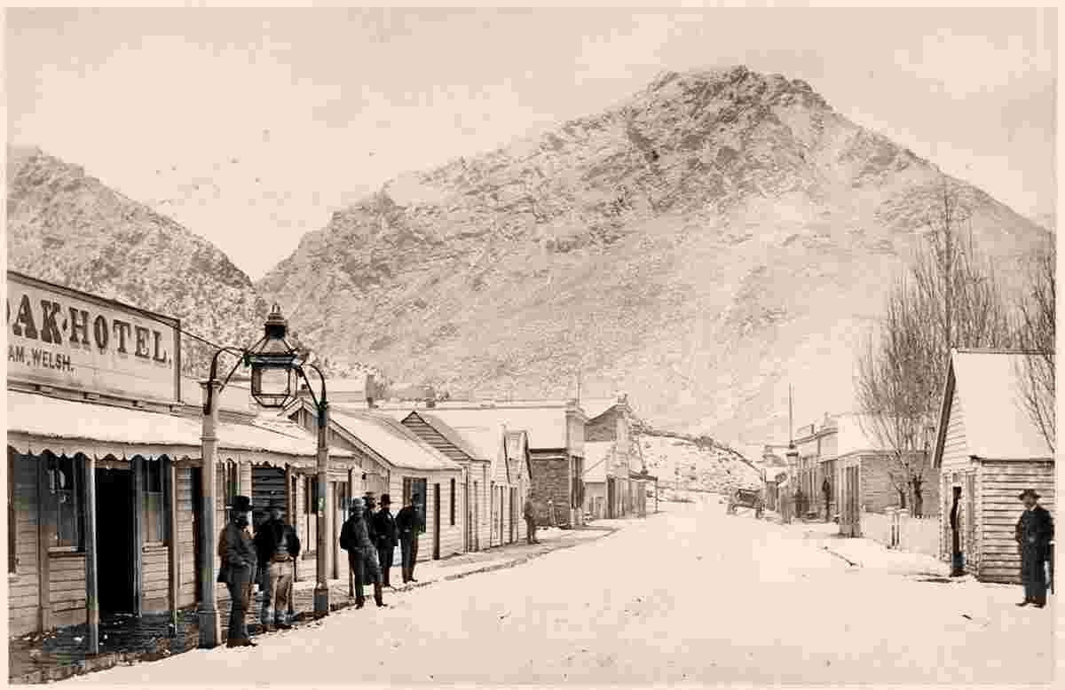Arrowtown. Panorama of street, winter, 1880s