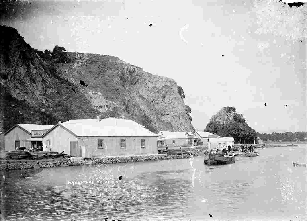 Whakatane. Shop of George Creeke (grocer and baker) behind a small building, 1900s