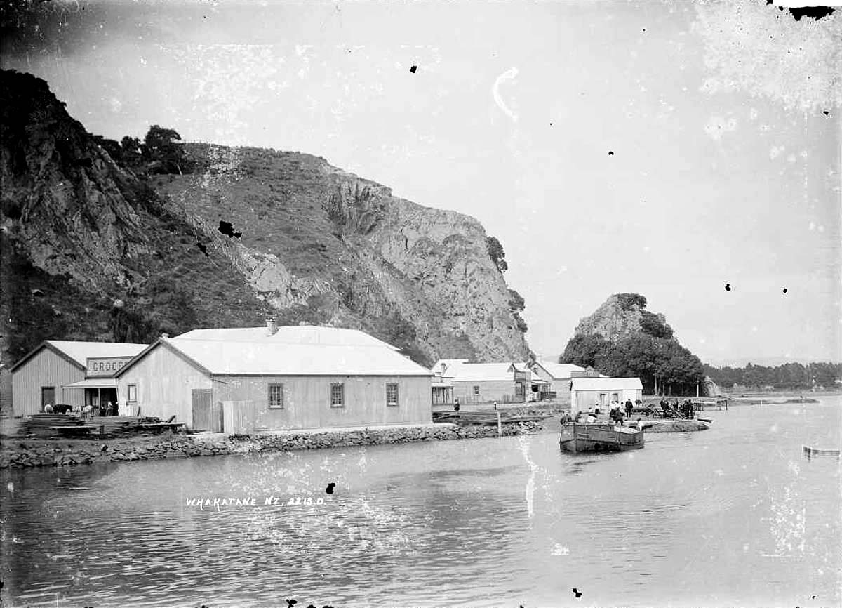 Whakatane. Shop of George Creeke (grocer and baker) behind a small building, 1900s
