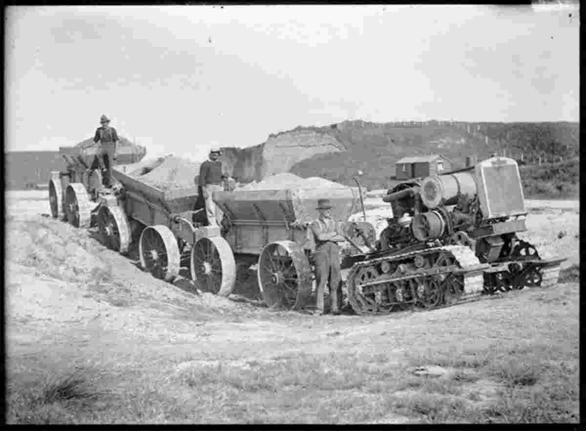 Whangarei. Tractor, wagons and workers, circa 1925