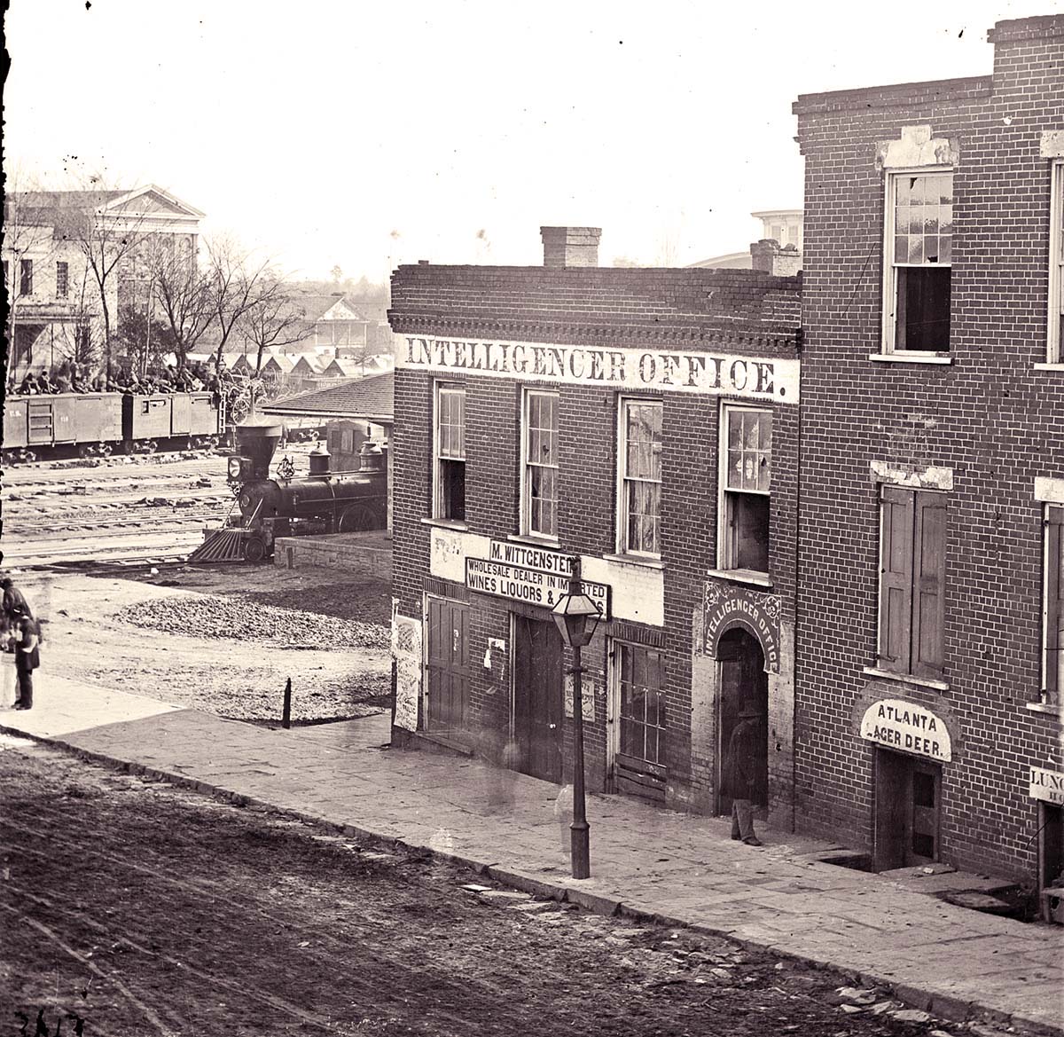 Atlanta. Intelligencer newspaper office by the railroad depot, 1864