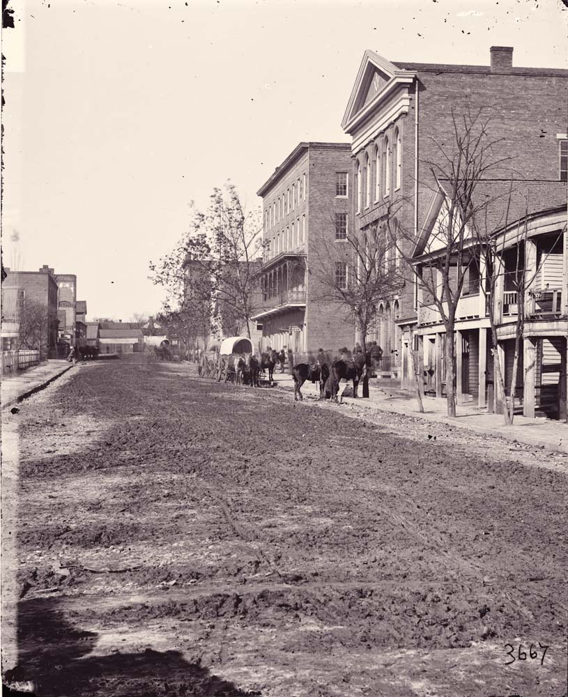 Atlanta. View on Decatur Street, showing Trout House and Masonic Hall, 1864
