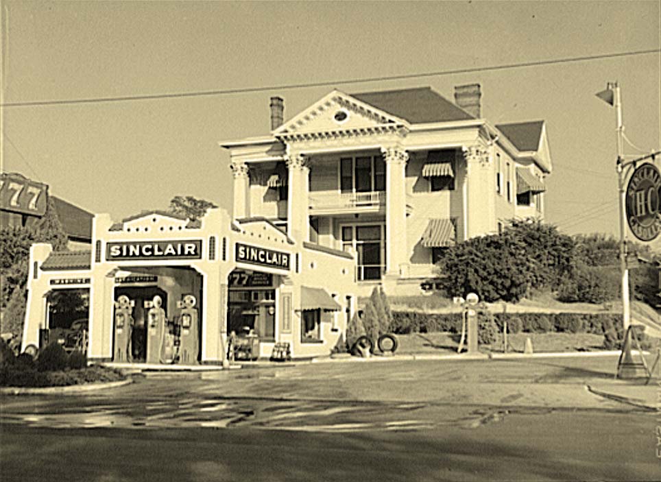 Jackson. Gas station in front of old colonial house, 1939