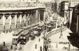 Dublin. Traffic of trams and cars on streets old Dublin