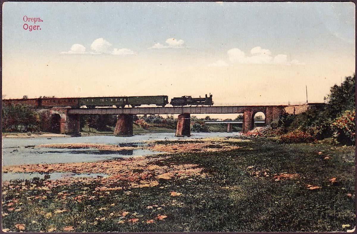 Ogre. Railway bridge across Ogre, train