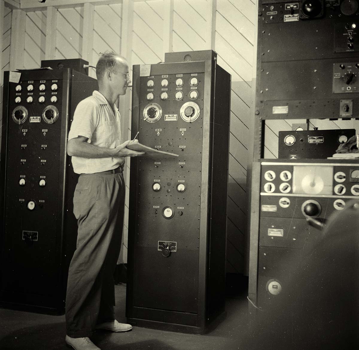 St John's. Charles Stellrecht at the radio tower, 1947