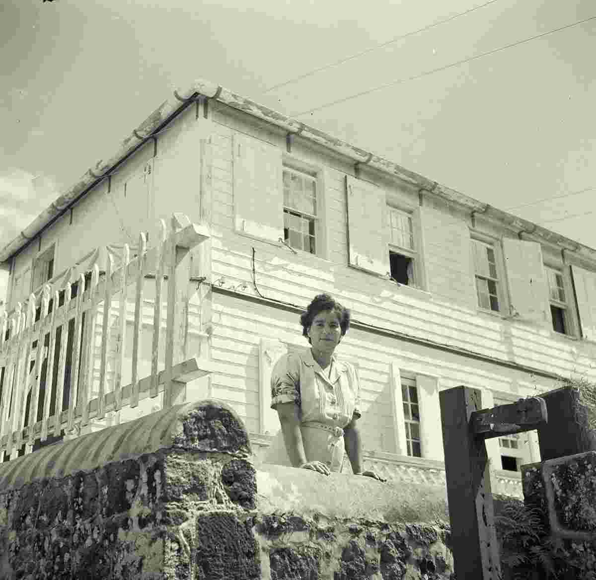 Windwardside. Mrs Chocolate in front of her house, 1947
