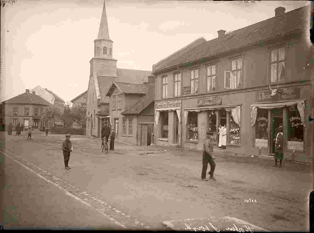 Horten. Panorama of city street with church, shops, between 1900 and 1925