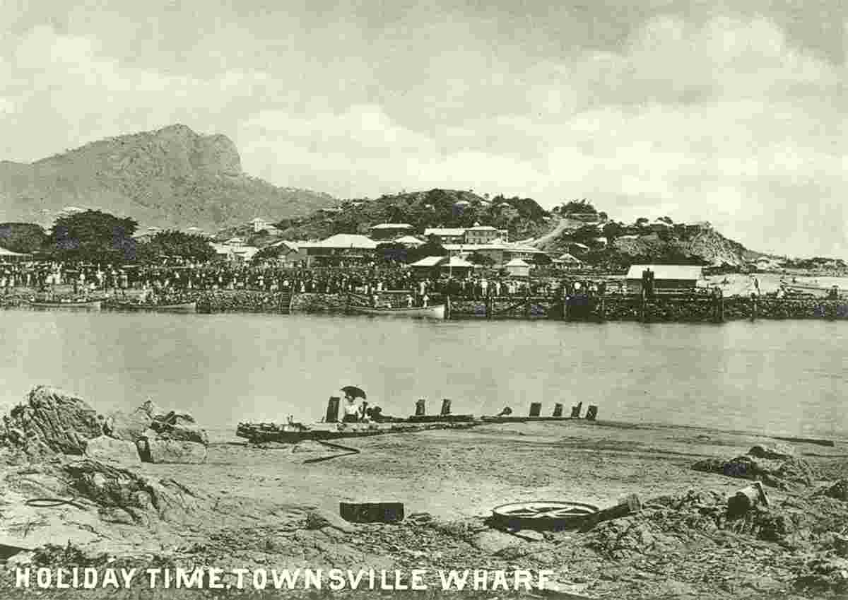 Townsville. Crowds line the Townsville wharf at holiday time Townsville