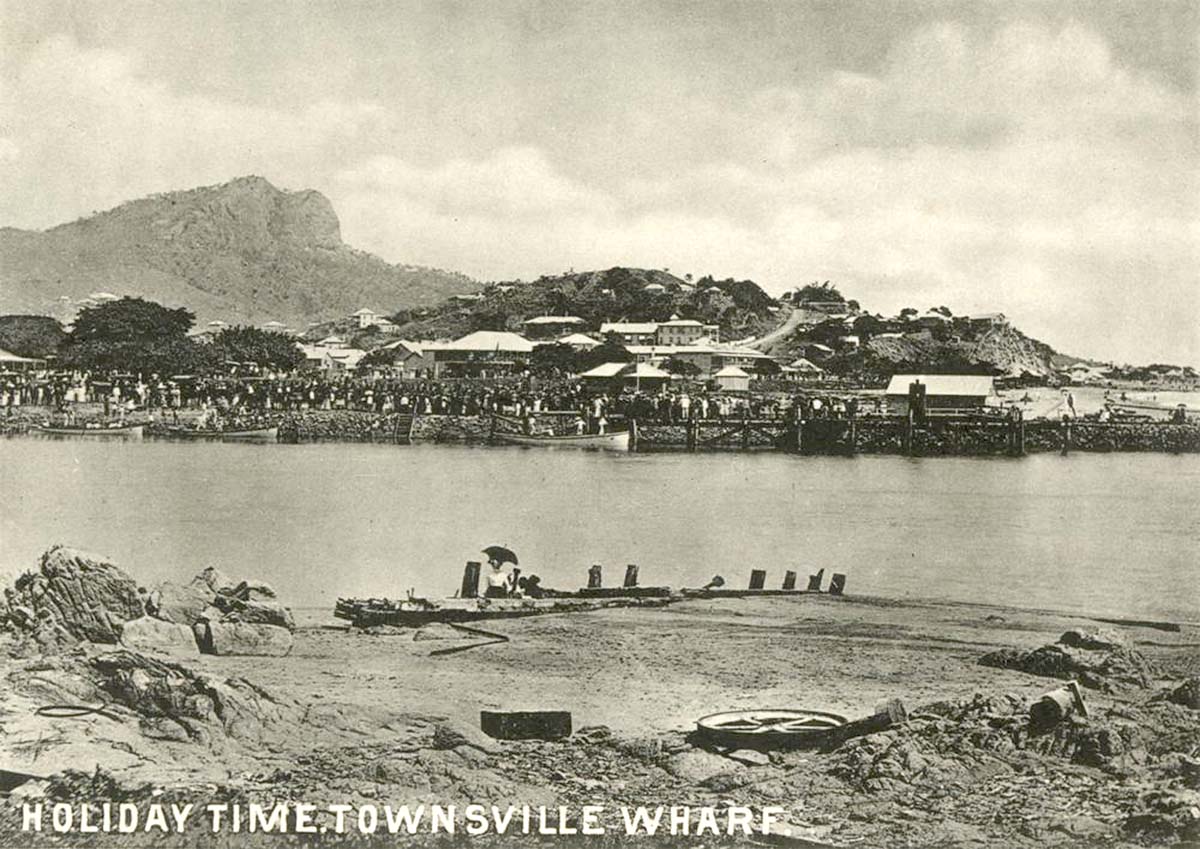 Crowds line the Townsville wharf at holiday time Townsville