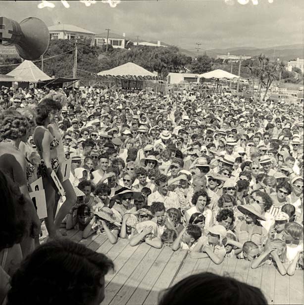 Contestants and spectators, Bathing Beauty Contest, Paraparaumu Beach, 1958