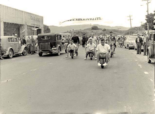 Paraparaumu. Wheelbarrow racing down, Paraparaumu Beach, 1955