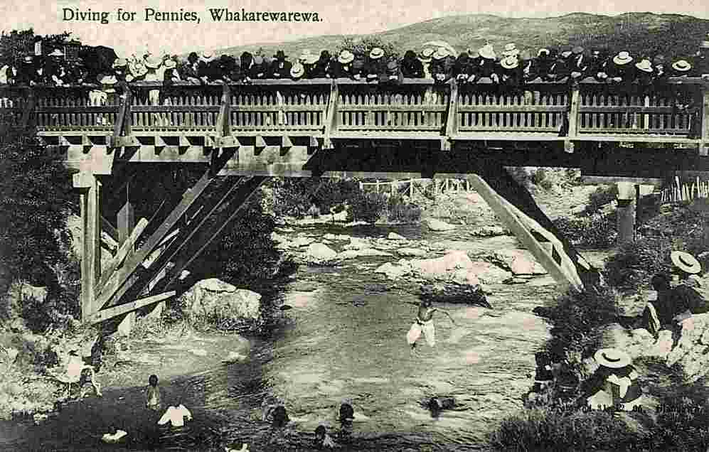 Rotorua. Whakarewarewa, people on Bridge, bathers