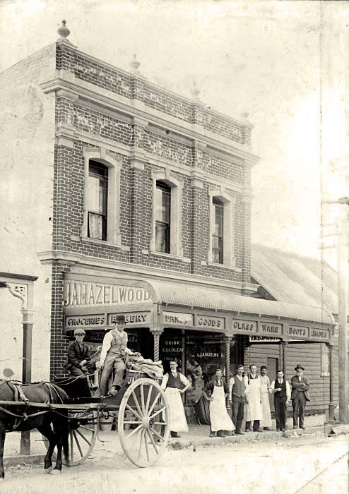 Upper Hutt. Men in front of J. A. Hazlewood's shop, circa 1900's